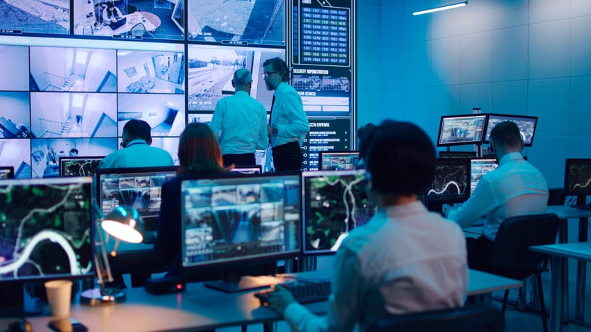 team working in a control room