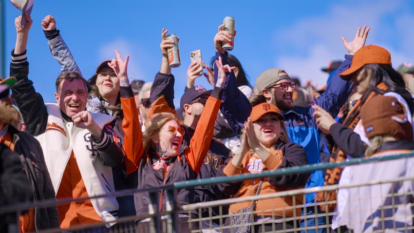 Giants fans cheering in the stand